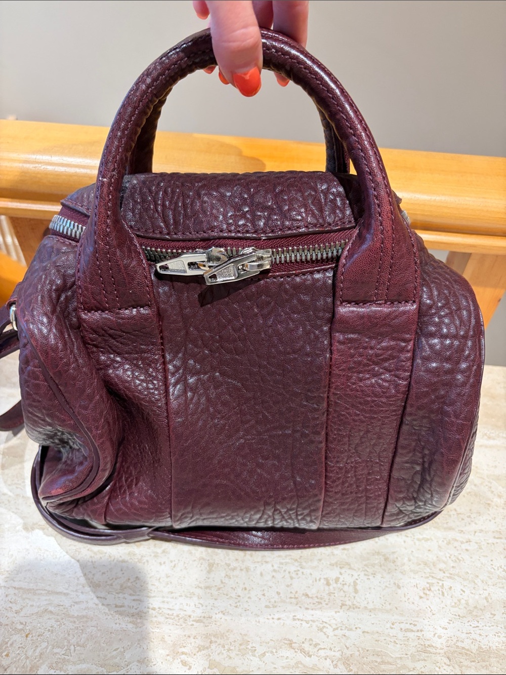 Alexander Wang Rocco Duffle Bag in a burgundy pebbled leather finish